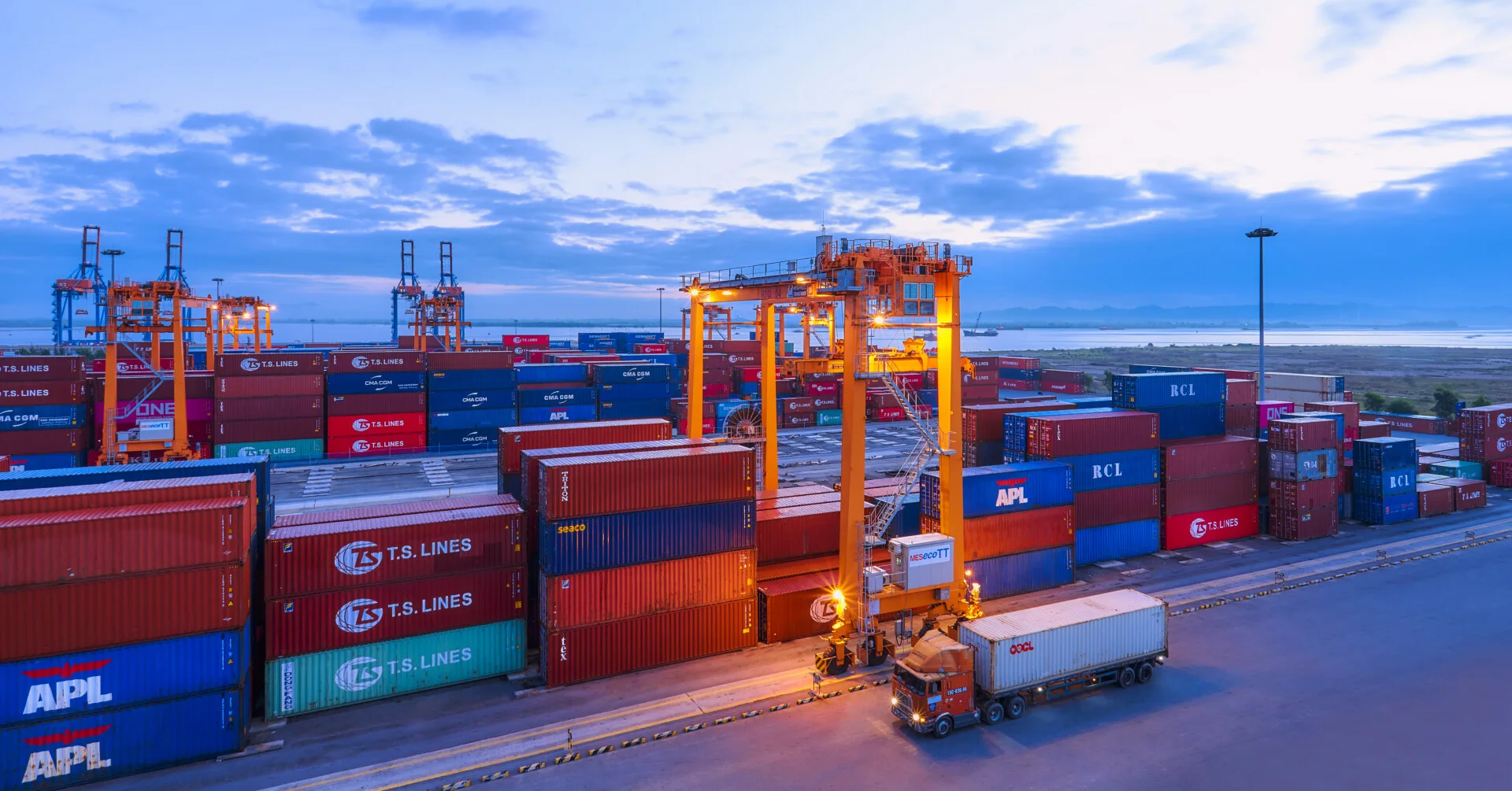 21 E-RTGs & <br> 12 Reach Stacker